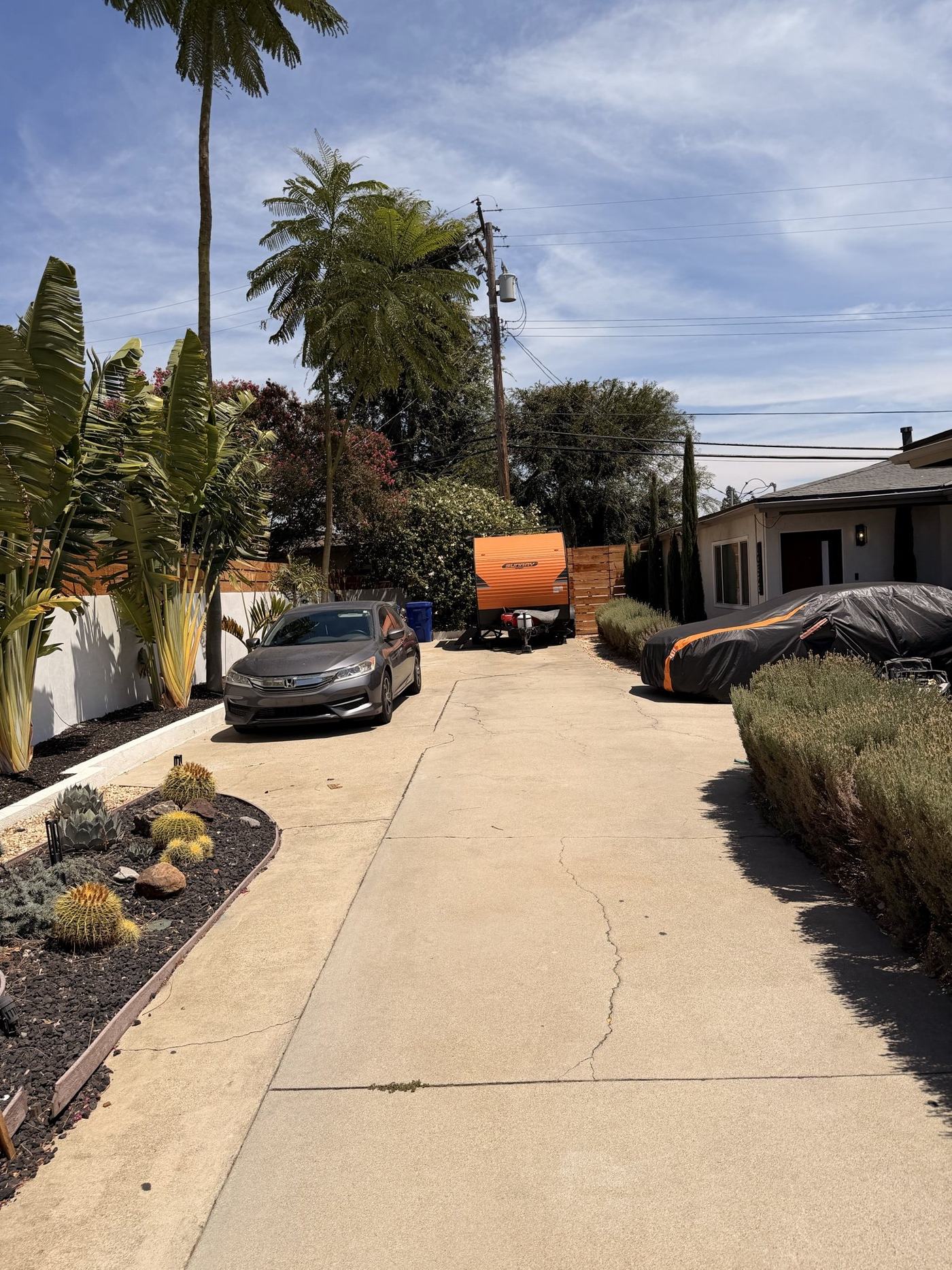 Wide driveway approach and off-street parking at Her Aria women's recovery residence, Montclair CA